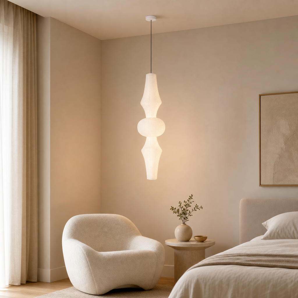 Akari rice paper E pendant light in a calm bedroom lounge