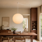Akari round paper globe swag light, Dia 31.5 by H 29.9 inches, in a modern walnut living room