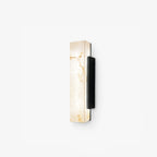 Alura waterproof LED wall light in black and alabaster white