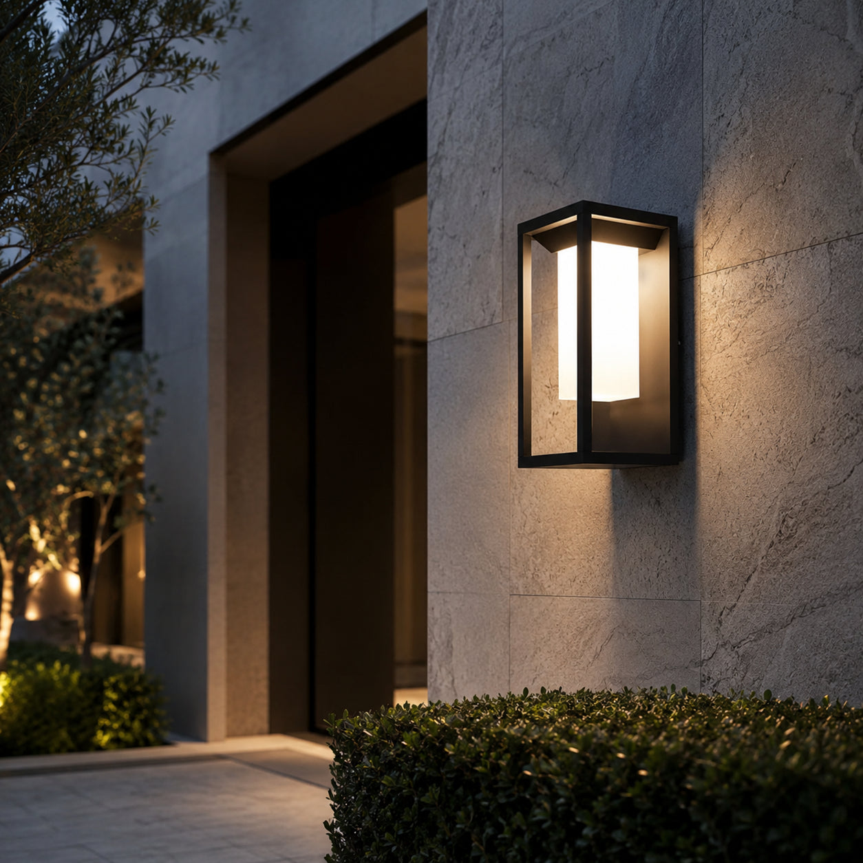 Avrn outdoor wall light with black rectangular frame and frosted diffuser