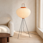 Akari 10A rice paper floor lamp in a warm modern living room