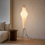 Akari 14A Slim rice paper floor lamp in a quiet living room