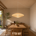 Large Akari 15A rice paper swag light with white cord in a ceiling-supported room scene