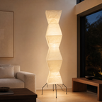 Large Akari rice paper floor lamp in an evening living room