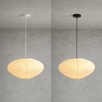 Akari A pendant light shown with white and black suspension colors