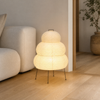 Akari Model B Small Japanese paper lantern floor lamp in a warm Japandi interior